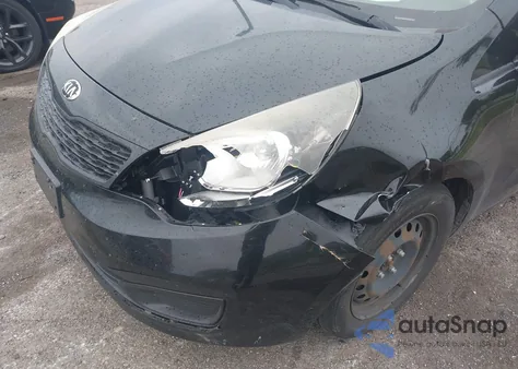 2014 Kia Rio Lx z USA, uszkodzony, nr VIN KNADM4A39E6402204